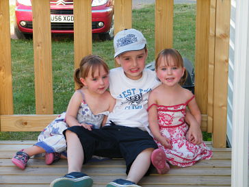 The trio on holiday decking.jpg